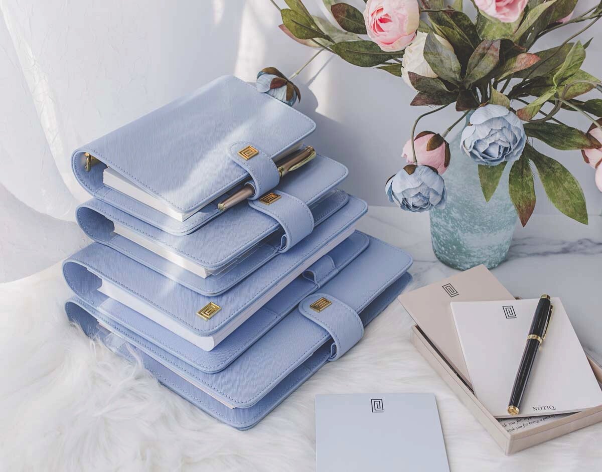 Vegan leather bliss blue saffiano stack of planners.