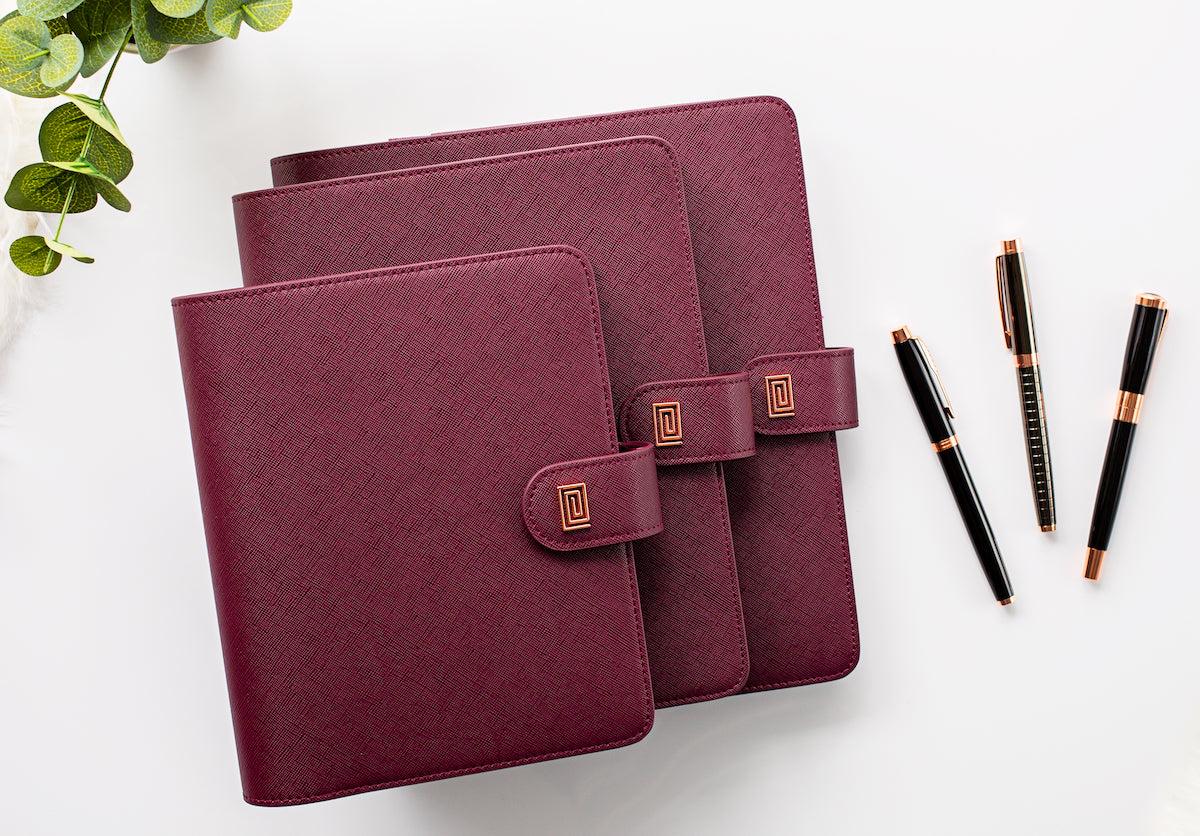 Luxury vegan leather mulberry saffiano agenda covers with executive pens.